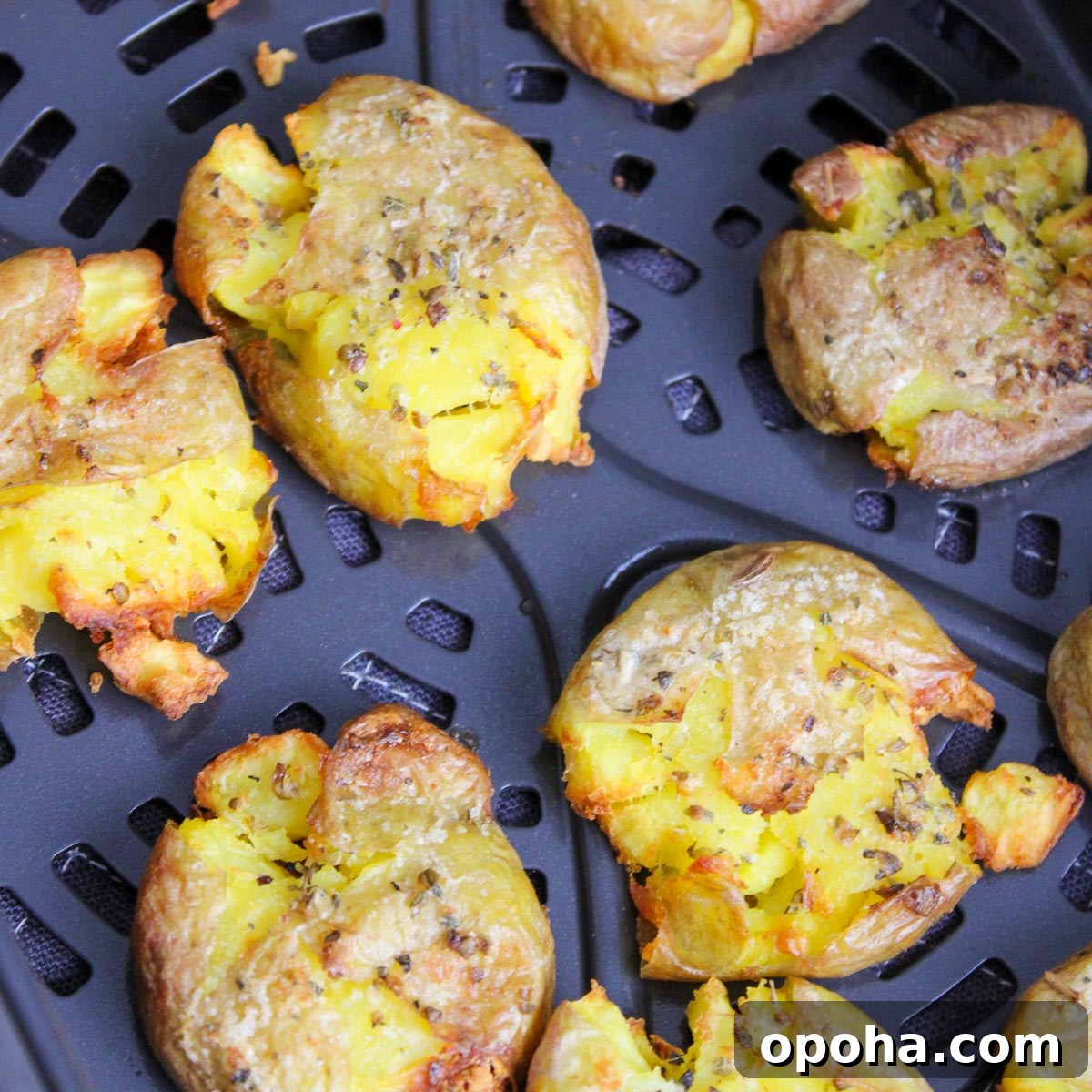 Crispy Air Fryer Smashed Potatoes Recipe 8 Cooked potatoes in an air fryer until they are golden brown.