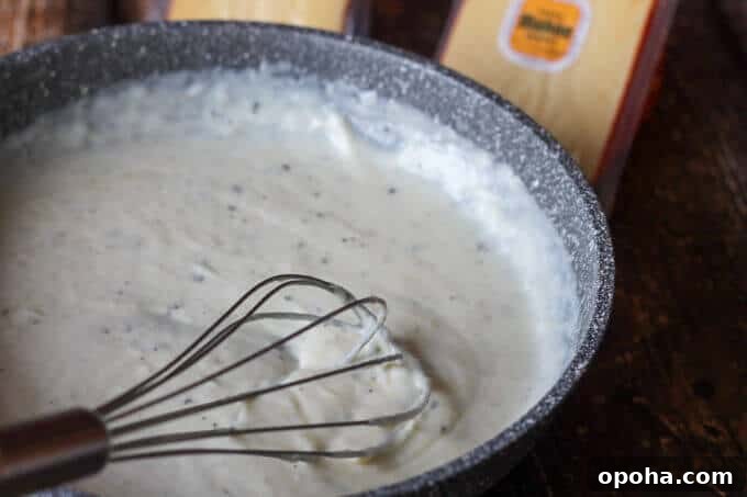 Pan-Seared Ribeye with Cracked Pepper & Mahon Menorca Cheese Sauce