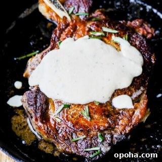 Pan-Seared Ribeye with Cracked Pepper & Mahon Menorca Cheese Sauce