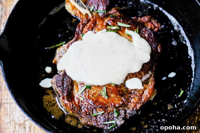 Pan-Seared Ribeye with Cracked Pepper & Mahon Menorca Cheese Sauce