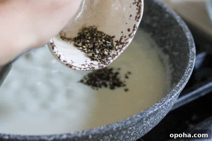 Pan-Seared Ribeye with Cracked Pepper & Mahon Menorca Cheese Sauce