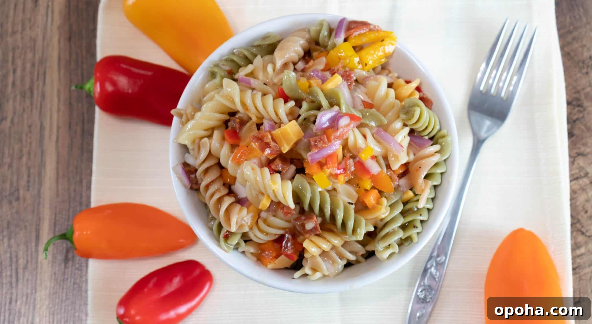 Classic Italian Pasta Salad Recipe for Summer Gatherings 3 Easy Italian Pasta Salad made with tricolor rotini pasta.