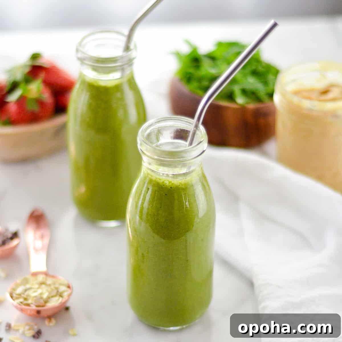 Banana Oatmeal Peanut Butter Smoothie Banana Oatmeal Peanut Butter Smoothie in two glasses with metal straws