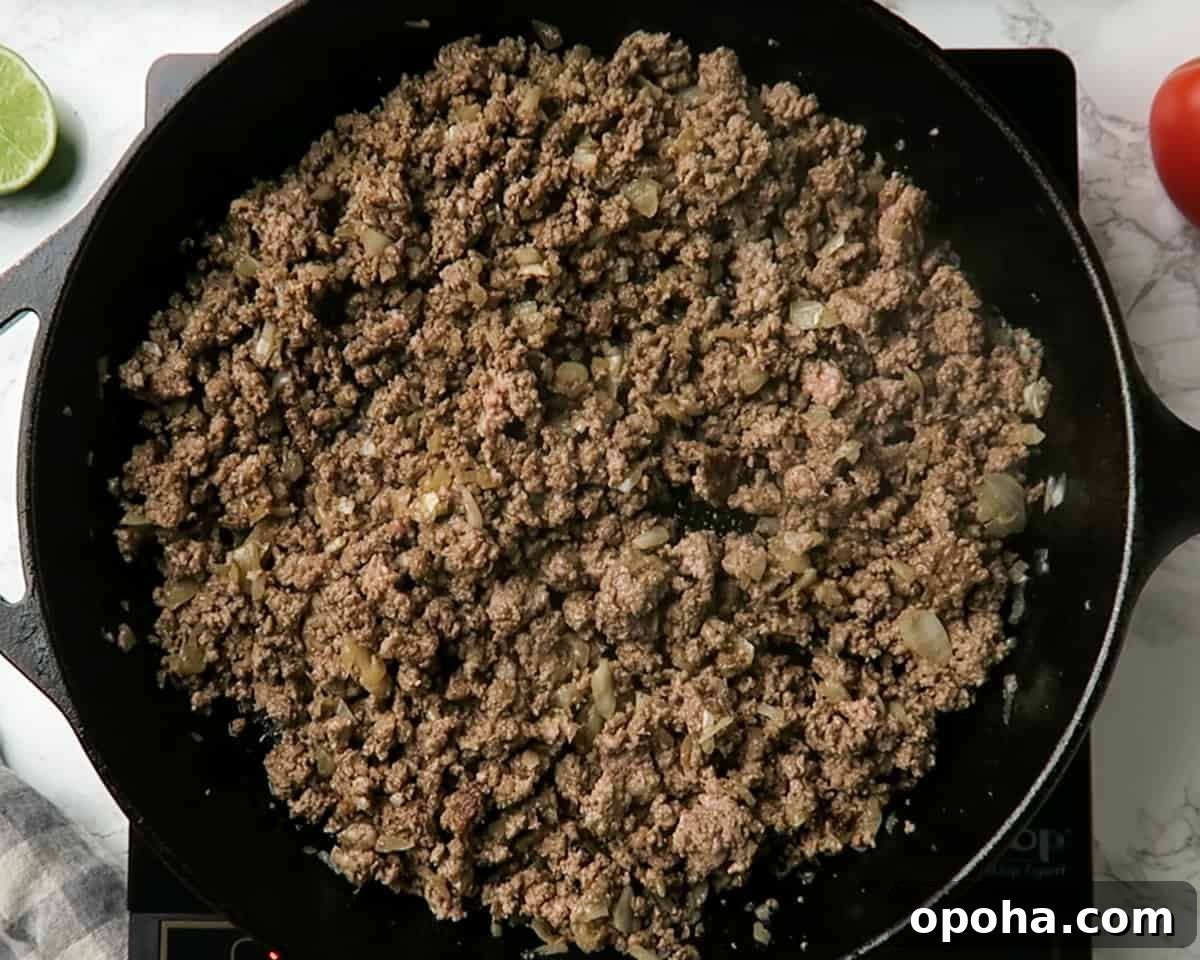 Taco Meat Recipe: Skillet, Instant Pot, or Crock Pot Options 4 lean ground beef shown after being browned in the cast iron skillet
