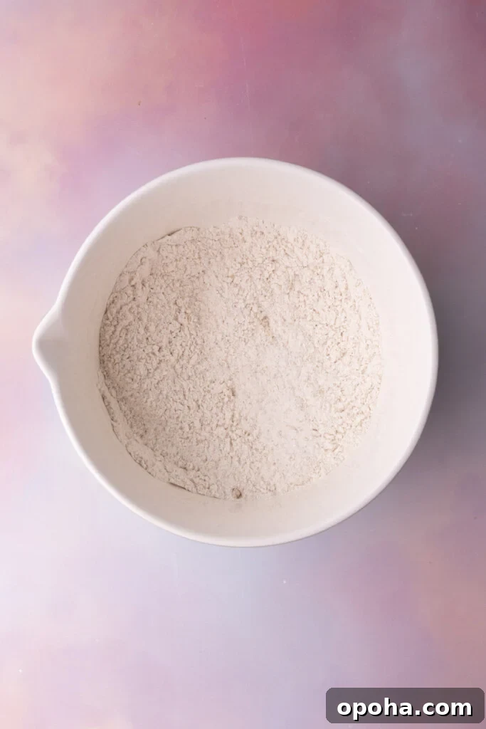 Flour, brown sugar, baking powder, and salt whisked together in a mixing bowl.