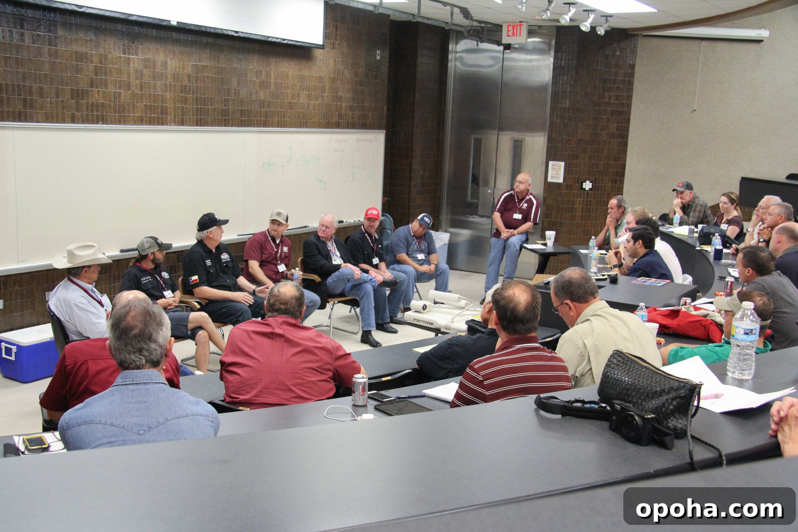 L-R: Tom Perini, Lance Kirkpatrick, Kent Black, Bryan Bracewell, Nick Nickelson, Russell Roegels and Israel Campos talking wood & smoke
