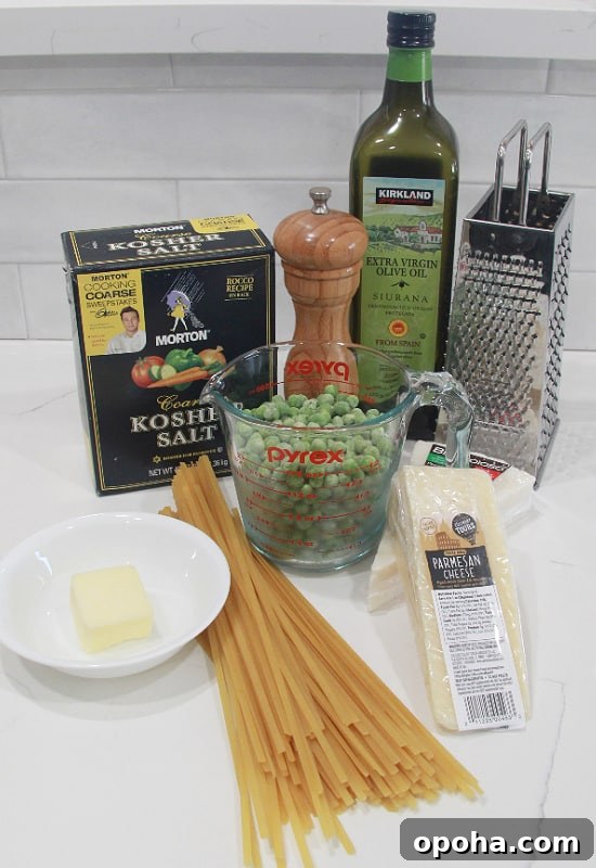 Fettuccine, olive oil, peas, and a wedge of Parmesan to be assembled.