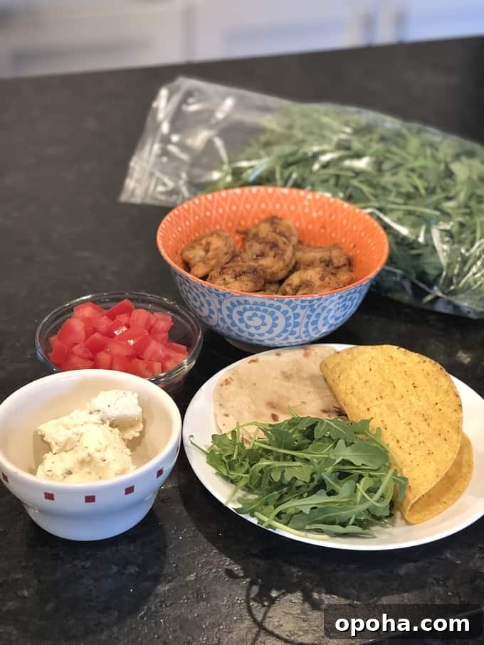 WeightWatchers-Friendly Spiced Shrimp Tacos with Lime Slaw 2 Spice-rubbed shrimp, diced tomatoes, cheese, arugula and taco shells for making soft shrimp tacos