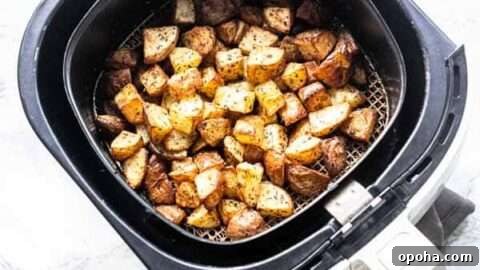 Air Fryer roasted potatoes: tender inside, crispy outside.