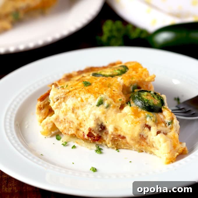 14 Delicious Easter Recipes to Make at Home 6 Slice of a jalapeno popper quiche on a white plate