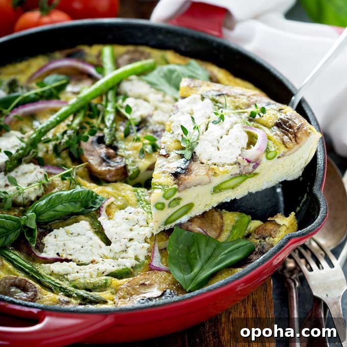 14 Delicious Easter Recipes to Make at Home 7 Slice of frittata lifted from a red skillet