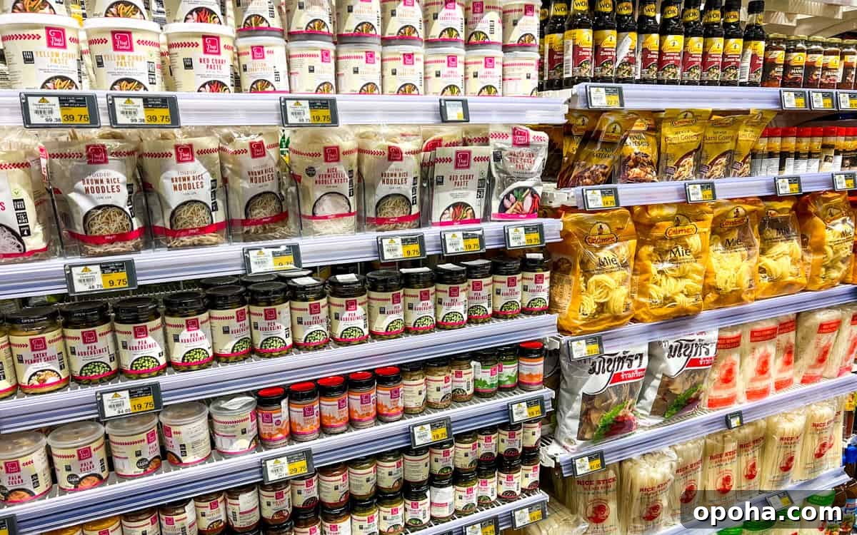 Photo of supermarket shelves filled with Thai condiments.