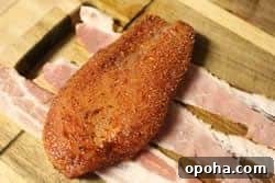 Juicy Bacon-Wrapped Chicken Breast Recipe for Dinner 9 chicken breast covered in rub on top of bacon