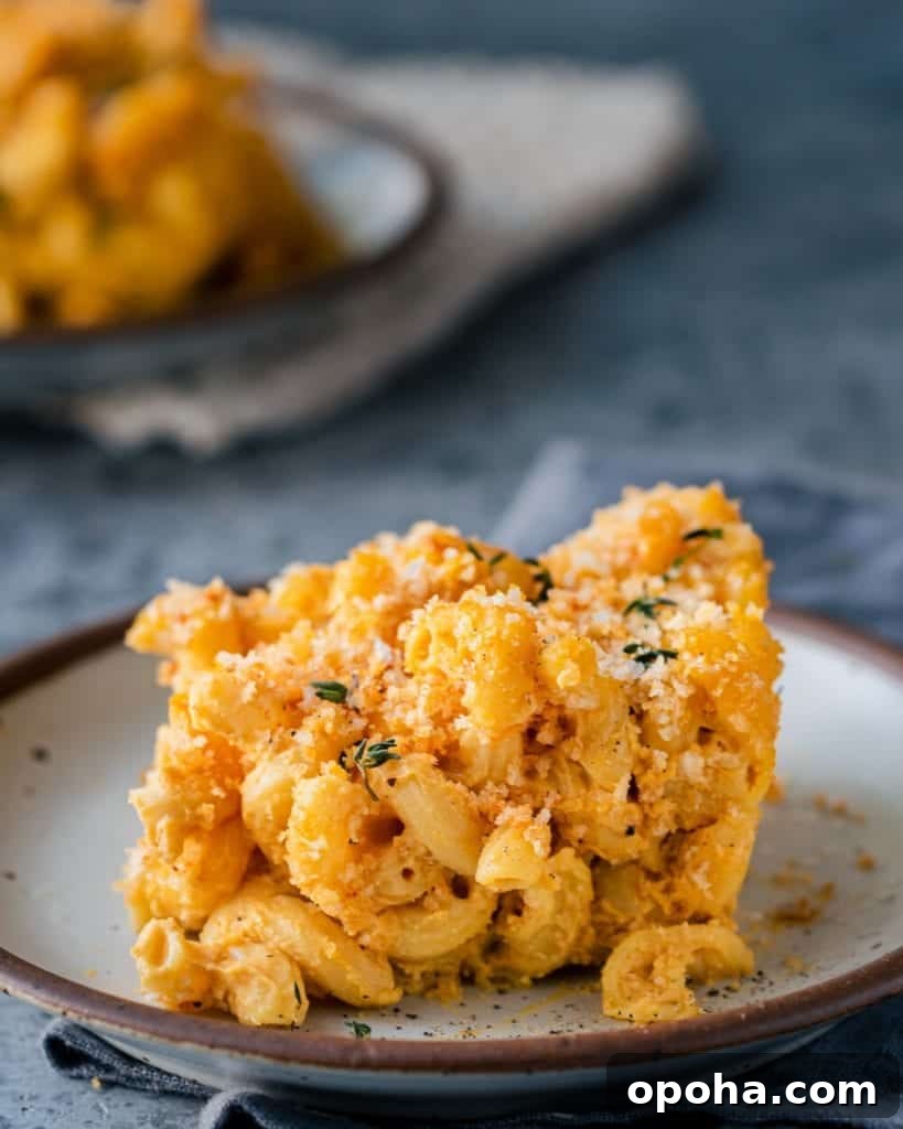 sliced of crispy baked vegan mac and cheese on plate