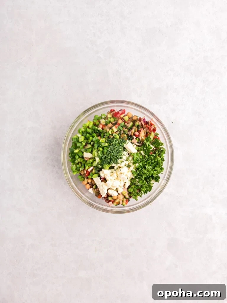 Mediterranean Tuna and Chickpea Salad ingredients in a bowl