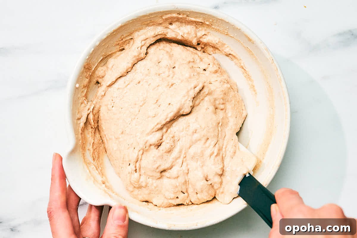 High-Protein Cottage Cheese Pancakes for Muscle Gain and Weight Loss 9 High protein cottage cheese pancake batter being mixed in a bowl.