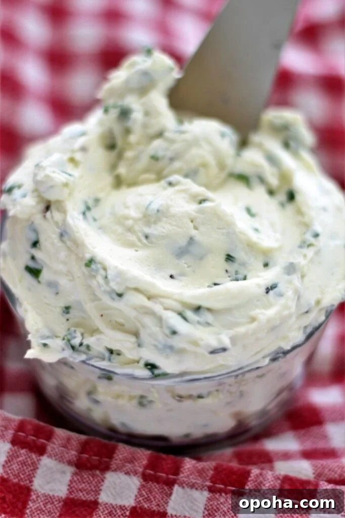 chive butter spread in crock on red checked towel