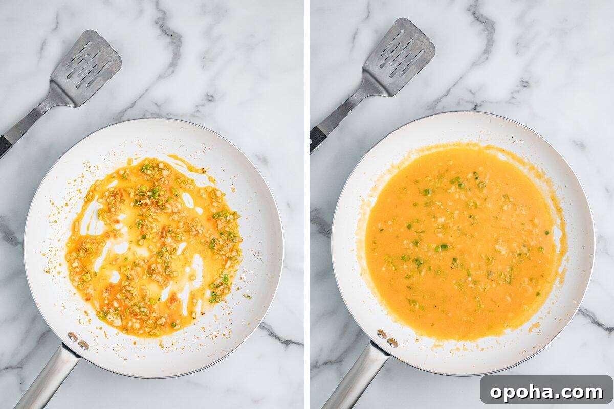 Creamy Shrimp and Grits with Cheddar and Garlic 8 A pair of images showing a white skillet during the process of making sauce. The left image shows garlic and chopped scallions sautéing in orange-colored liquid, and the right image shows the mixture thickened into a more uniform orange sauce.