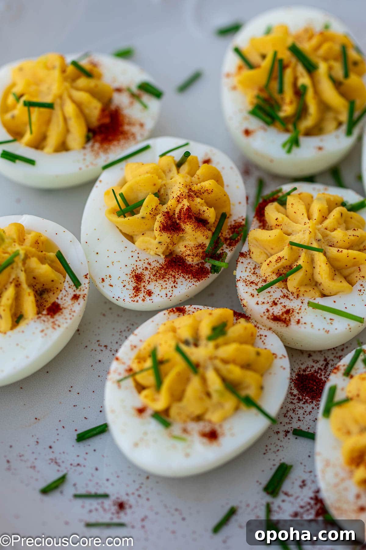 Classic Southern Deviled Eggs Recipe with Tangy Mustard-Fill 12 Deviled eggs with toppings.