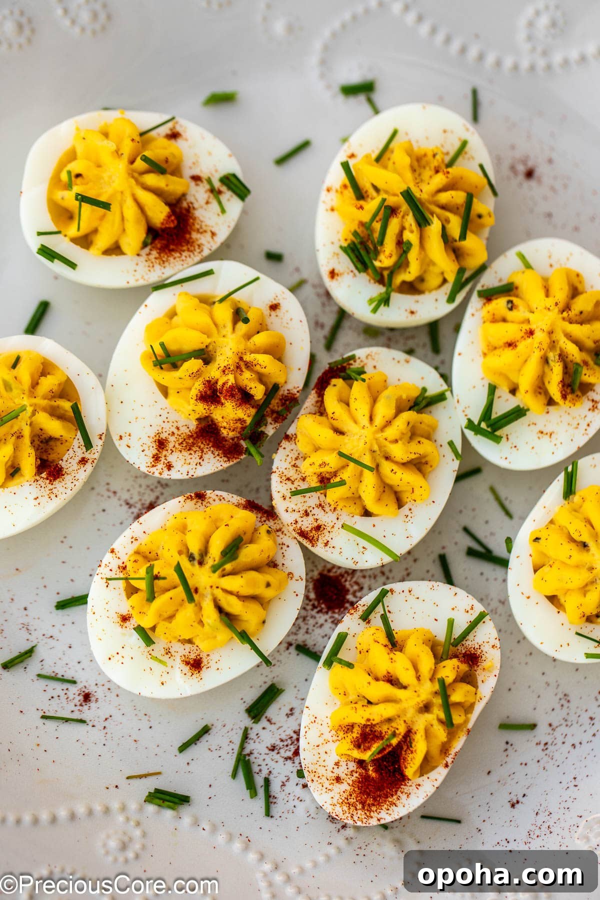 Classic Southern Deviled Eggs Recipe with Tangy Mustard-Fill 13 Deviled eggs with paprika and herbs.