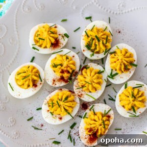 Classic Southern Deviled Eggs Recipe with Tangy Mustard-Fill 18 Platter of decorated deviled eggs.
