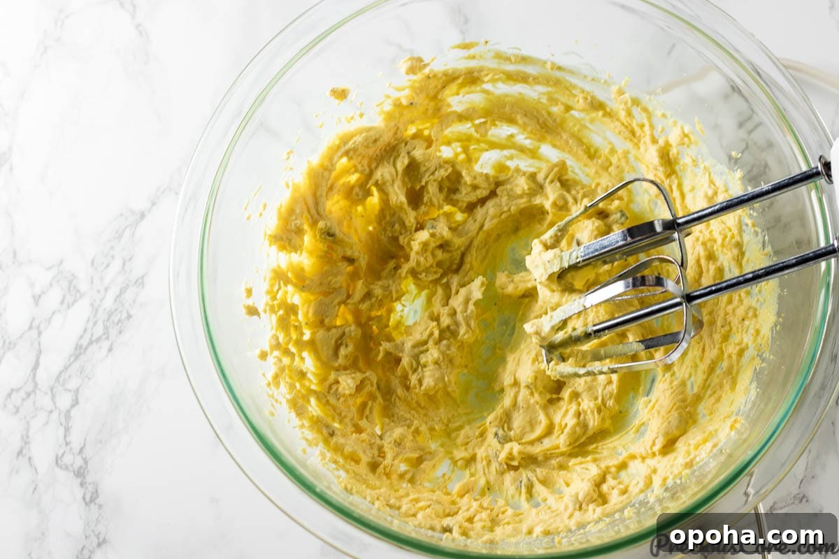 Classic Southern Deviled Eggs Recipe with Tangy Mustard-Fill 9 Fluffy deviled eggs filling for the best deviled eggs