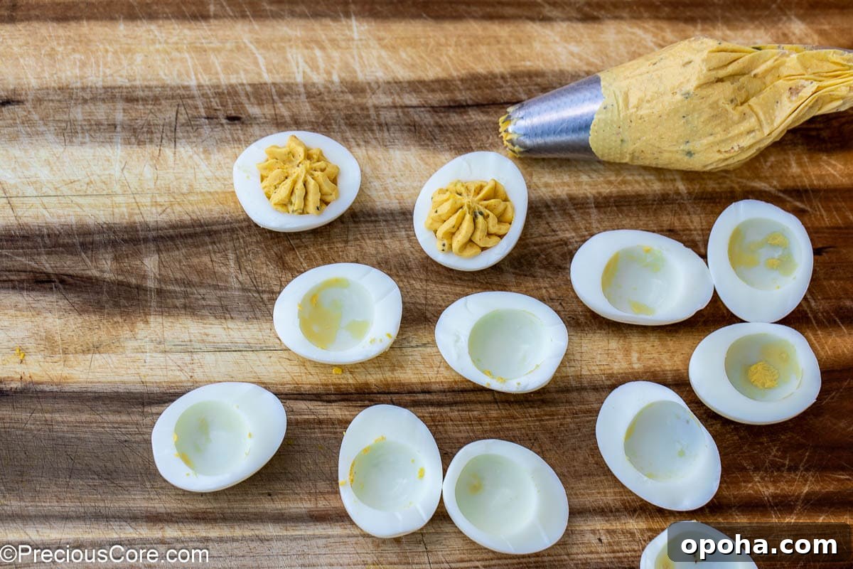 Classic Southern Deviled Eggs Recipe with Tangy Mustard-Fill 10 Piping bag for filling deviled eggs.