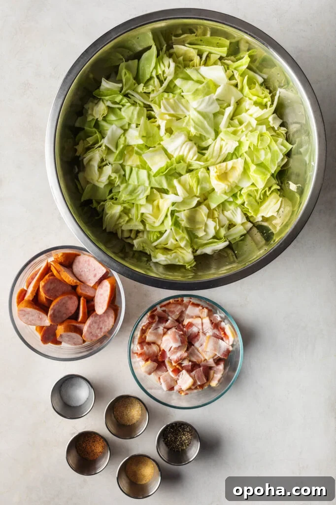 Southern-Style Fried Cabbage Recipe for Bold Flavor 3 bowl of chopped cabbage, bowl of sliced smoked sausage, bowl of chopped bacon, chicken bouillon powder, kosher salt, black pepper, granulated onion and garlic
