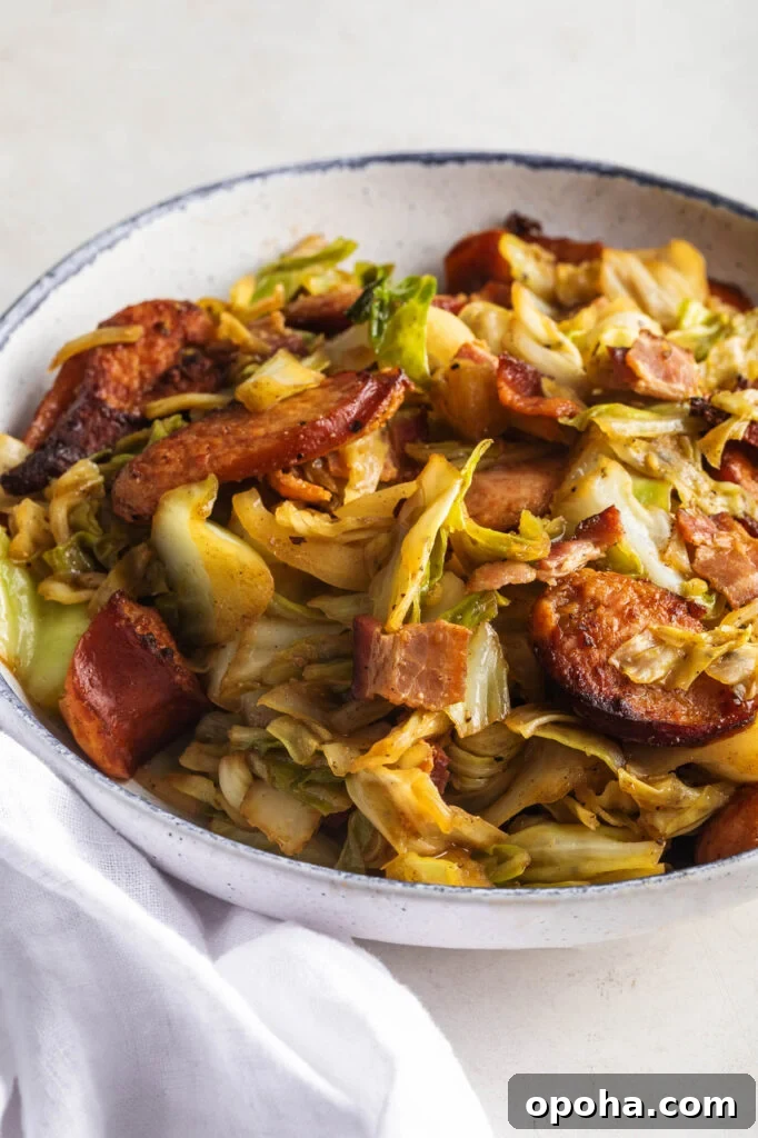 Southern-Style Fried Cabbage Recipe for Bold Flavor 10 bowl of southern fried cabbage with bacon and smoked sausage