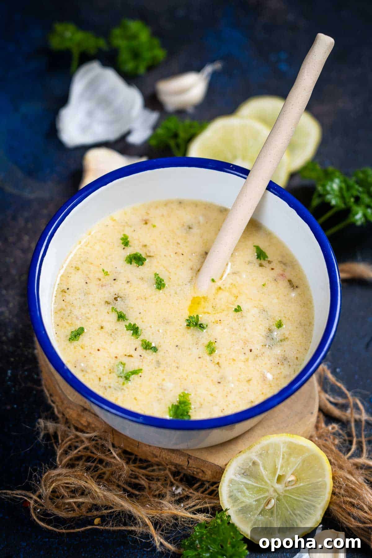 Lemon garlic butter sauce served in a bowl.