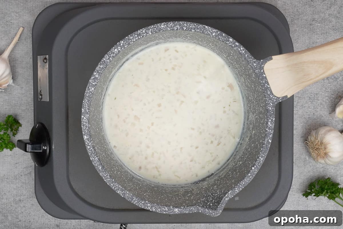 Mixture reduced to half.