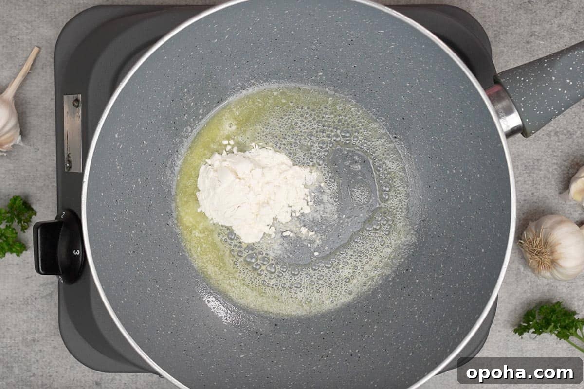 Flour added to the pan.