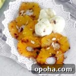 Air Fryer Cinnamon Pineapple Recipe — Grilled Flavor in Minutes 9 cropped up pineapples with icecream image for recipe card