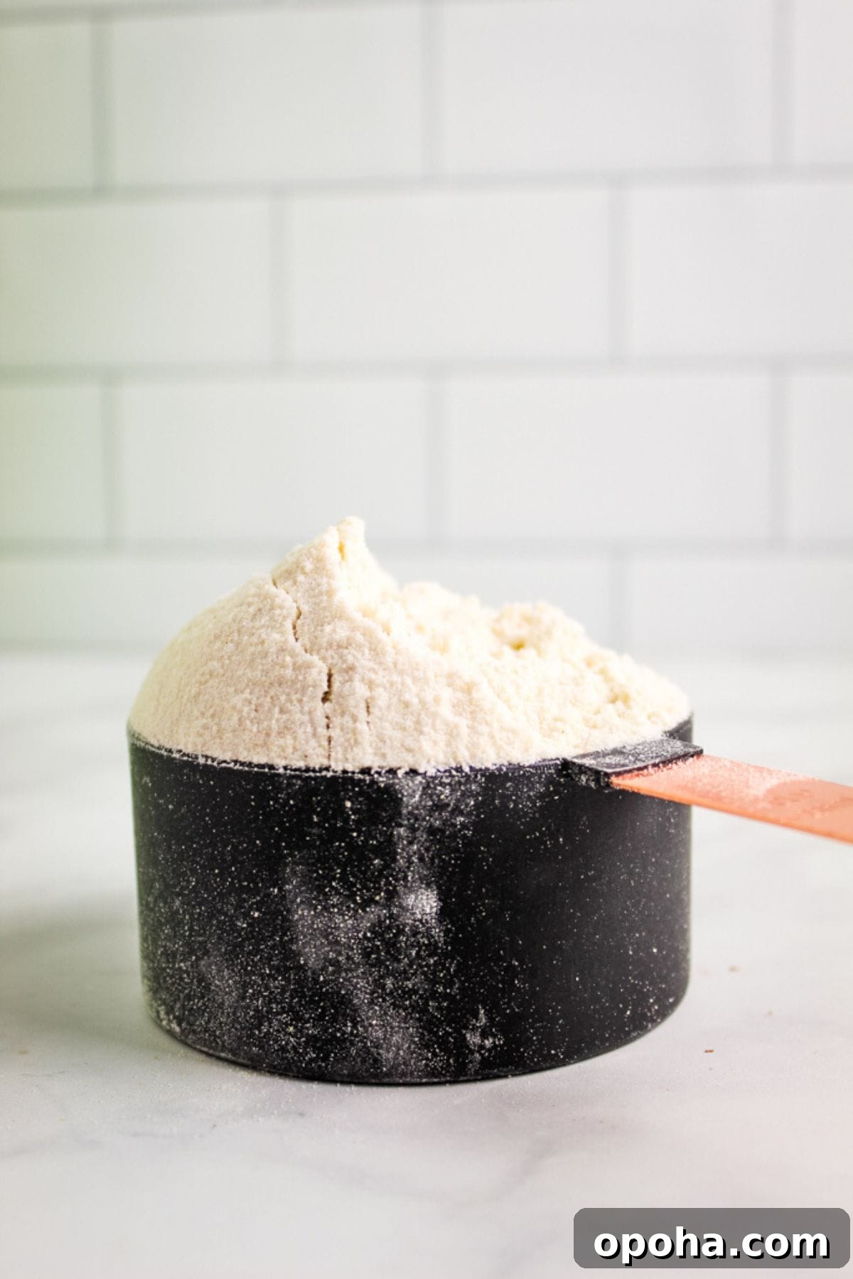 Long-Term Flour Storage Guide: Tips to Keep Flour Fresh for Months 3 black cup of flour