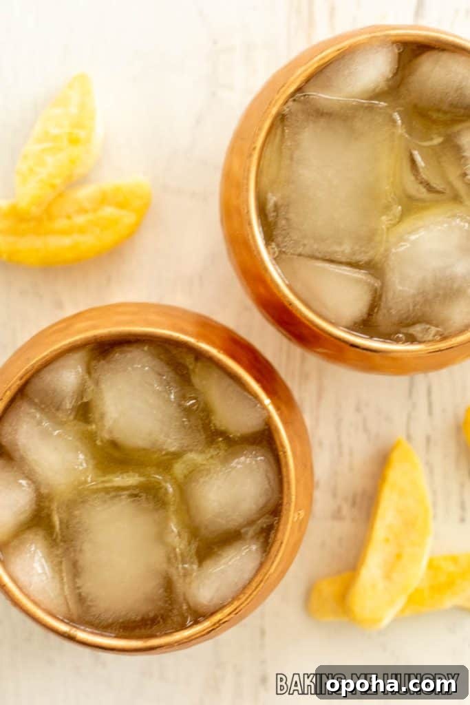 Mango Mule Mocktail Recipe: Refreshing Non-Alcoholic Cocktail 6 close up of mango mule mocktail in copper mugs