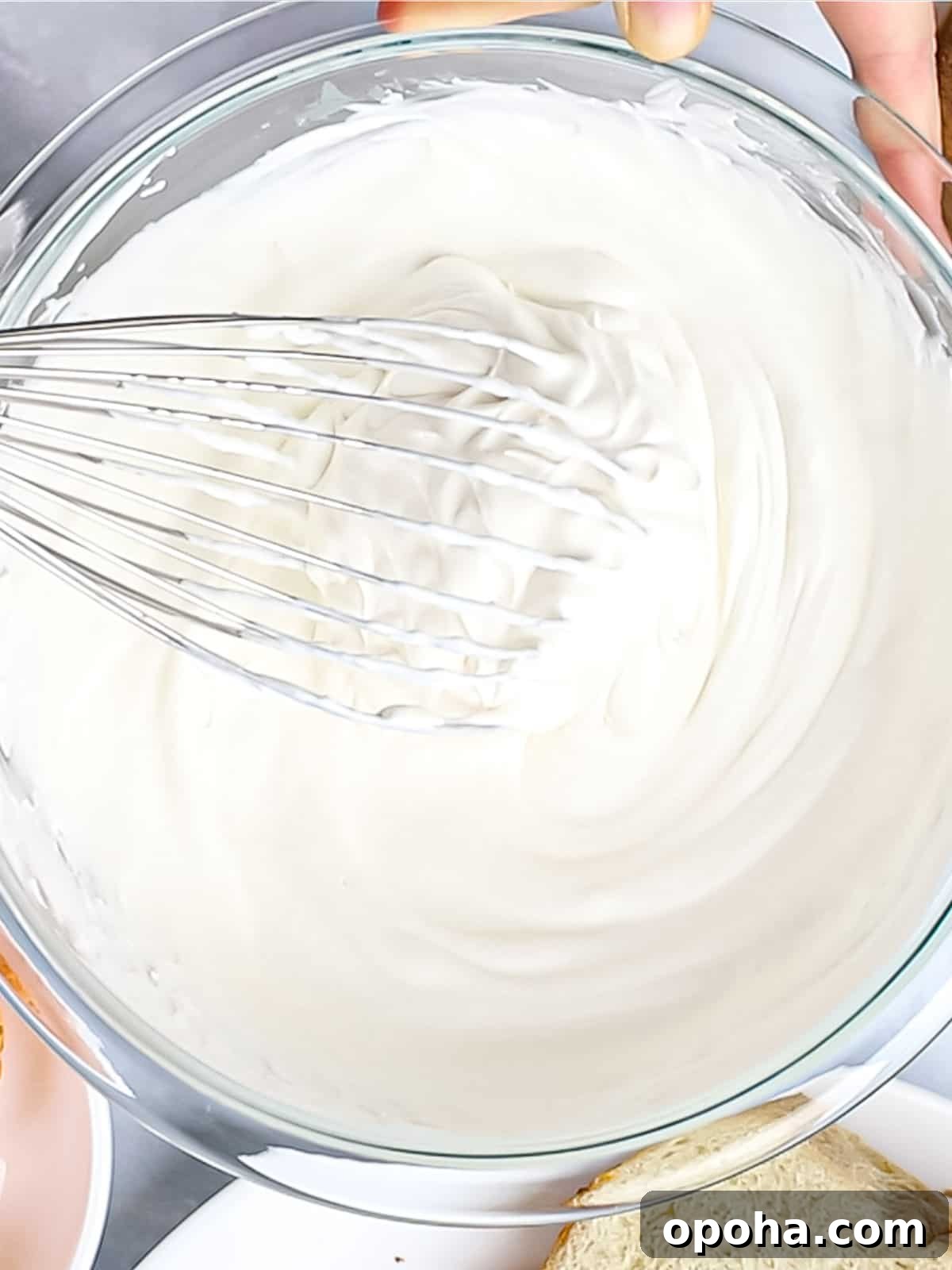 Japanese Fruit Sandwich (Strawberry Sando): How to Make フルーツサンド 6 Heavy cream being whipped until light and fluffy with a wire whisk.