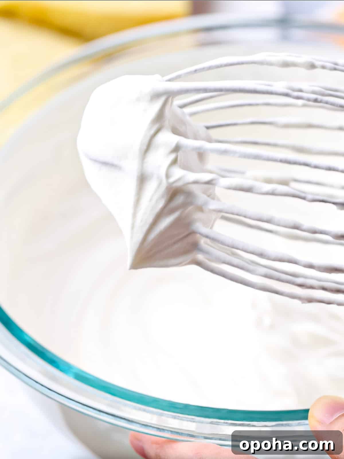 Japanese Fruit Sandwich (Strawberry Sando): How to Make フルーツサンド 7 Close up of fluffy whipped cream on the end of a whisk.