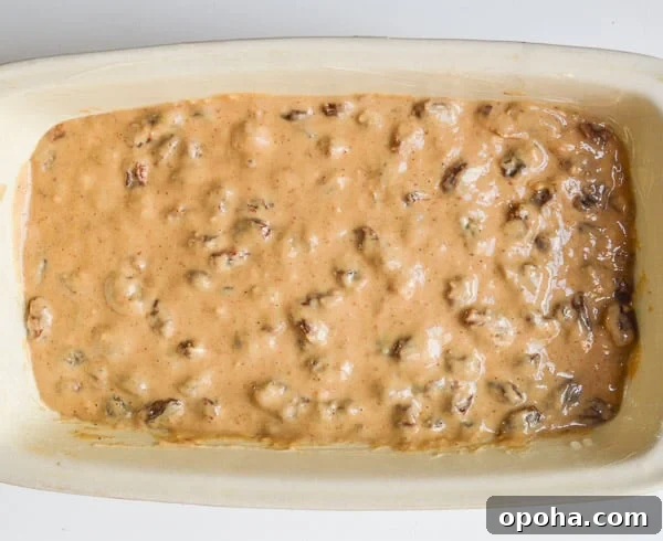 Traditional Irish Barmbrack Recipe for Perfect Fruit Tea Bread 7 A prepared batch of dough in a cream ceramic pan