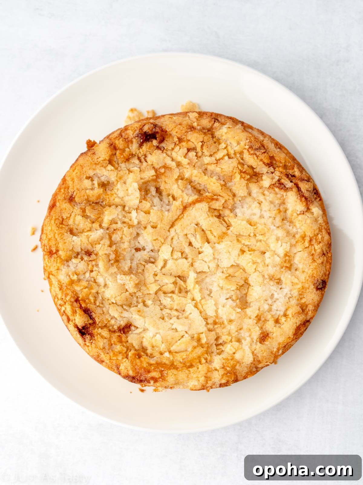 Round cake on a white plate. 