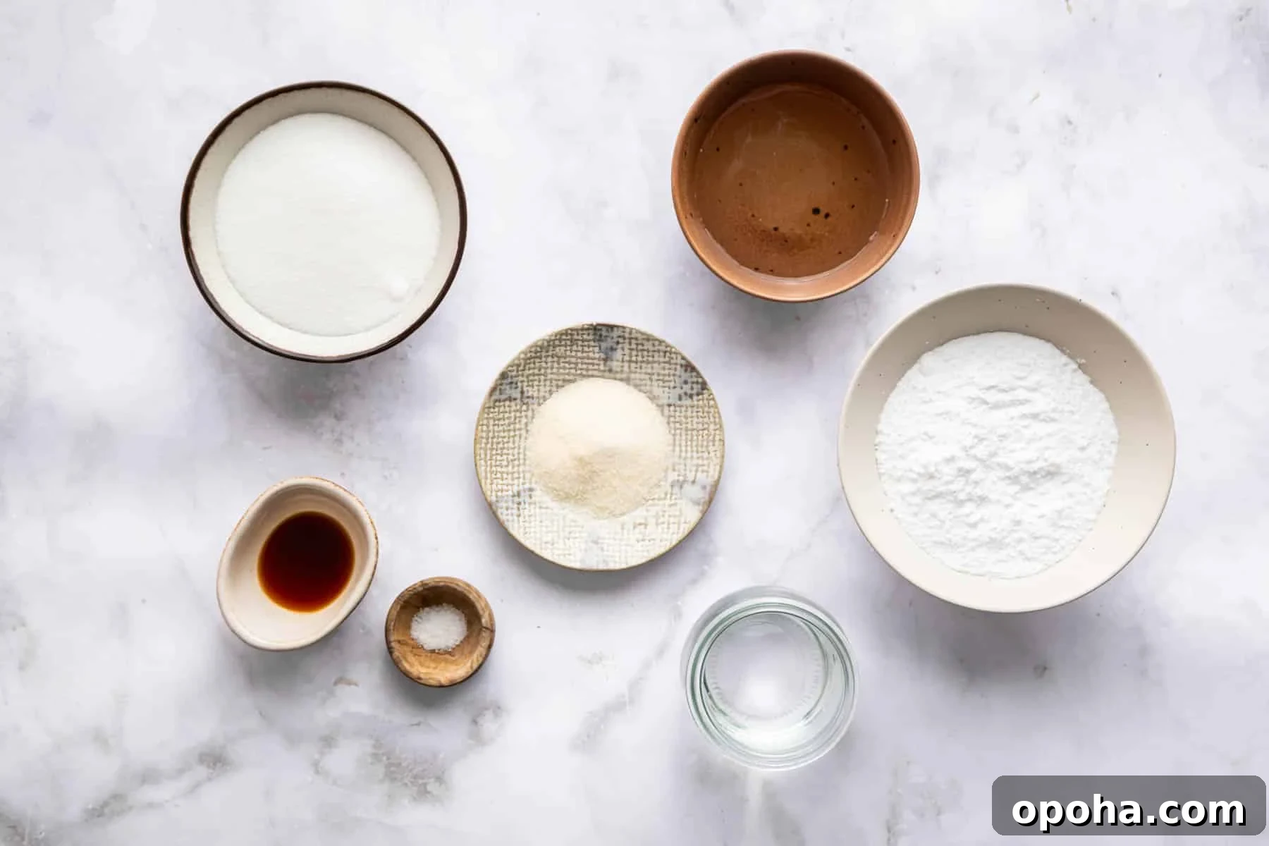 How to Make Homemade Marshmallows from Scratch: Fluffy Recipe 4 Bowl of corn syrup, sugar, water, and gelatin on kitchen counter.