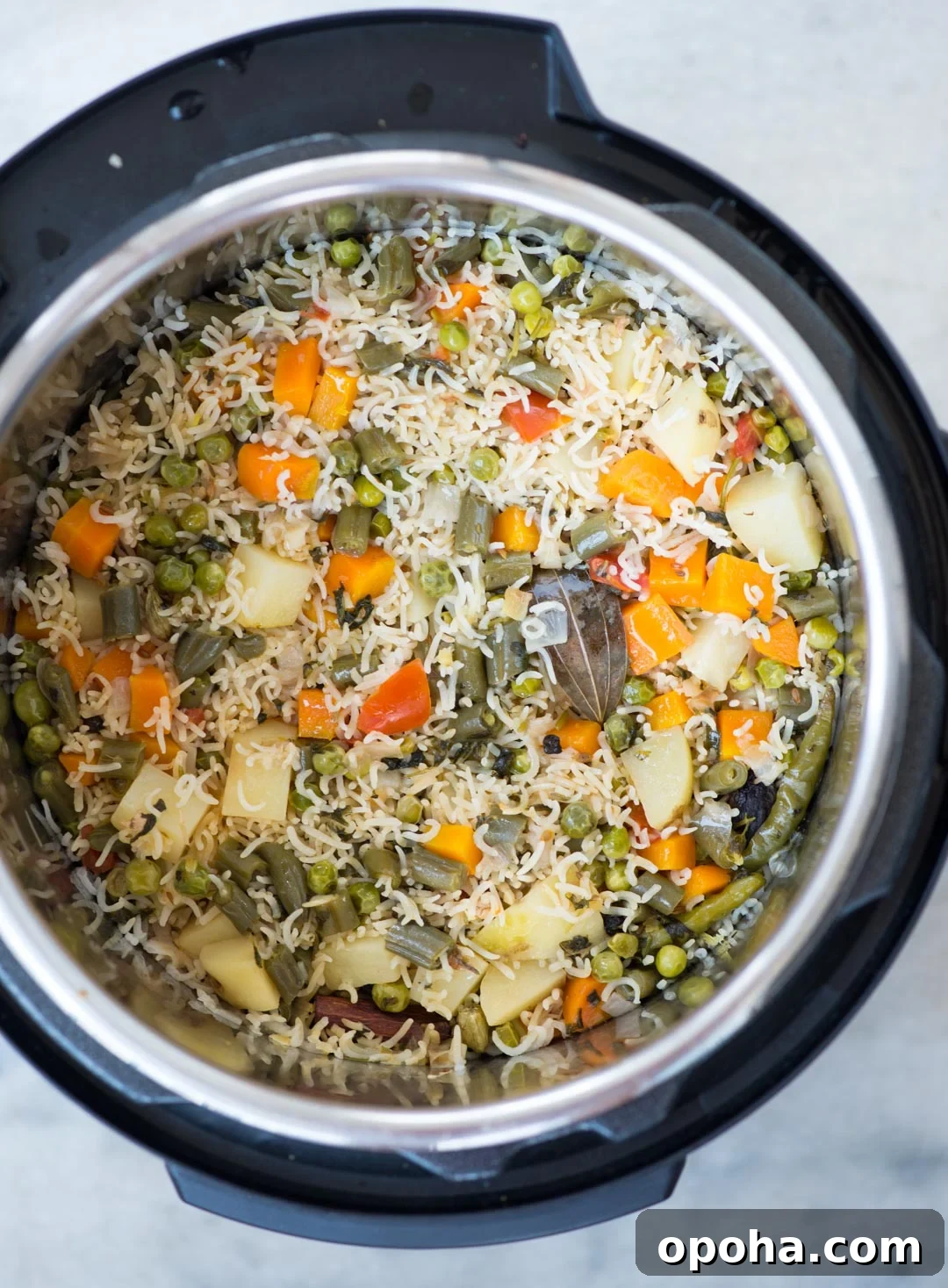 Top shot of vegetable pulao made with whole spices in an Instant Pot