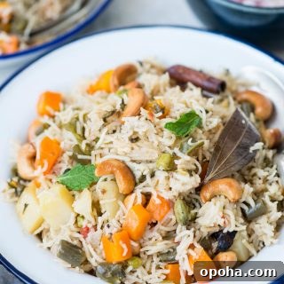 Veg Pualo is an Indian style rice pilaf made with long grain basmati rice, an array of vegetables and whole spices. This fragrant one-pot dish can be made on stove top, in a pressure cooker or in an Instant Pot.
