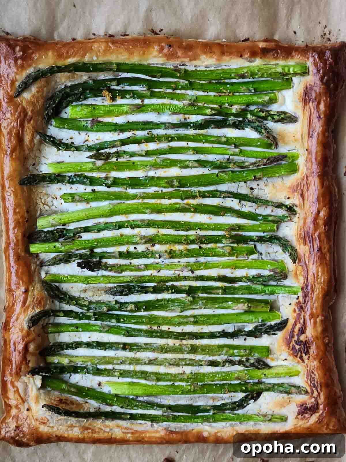 Asparagus Puff Pastry Tart with Whipped Goat Cheese Recipe 4 Overhead view of asparagus puff pastry with goat cheese.
