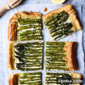 Asparagus Puff Pastry Tart with Whipped Goat Cheese Recipe 10 Overhead of asparagus and whipped goat cheese puff pastry tart cut into six pieces with a lemon to the side