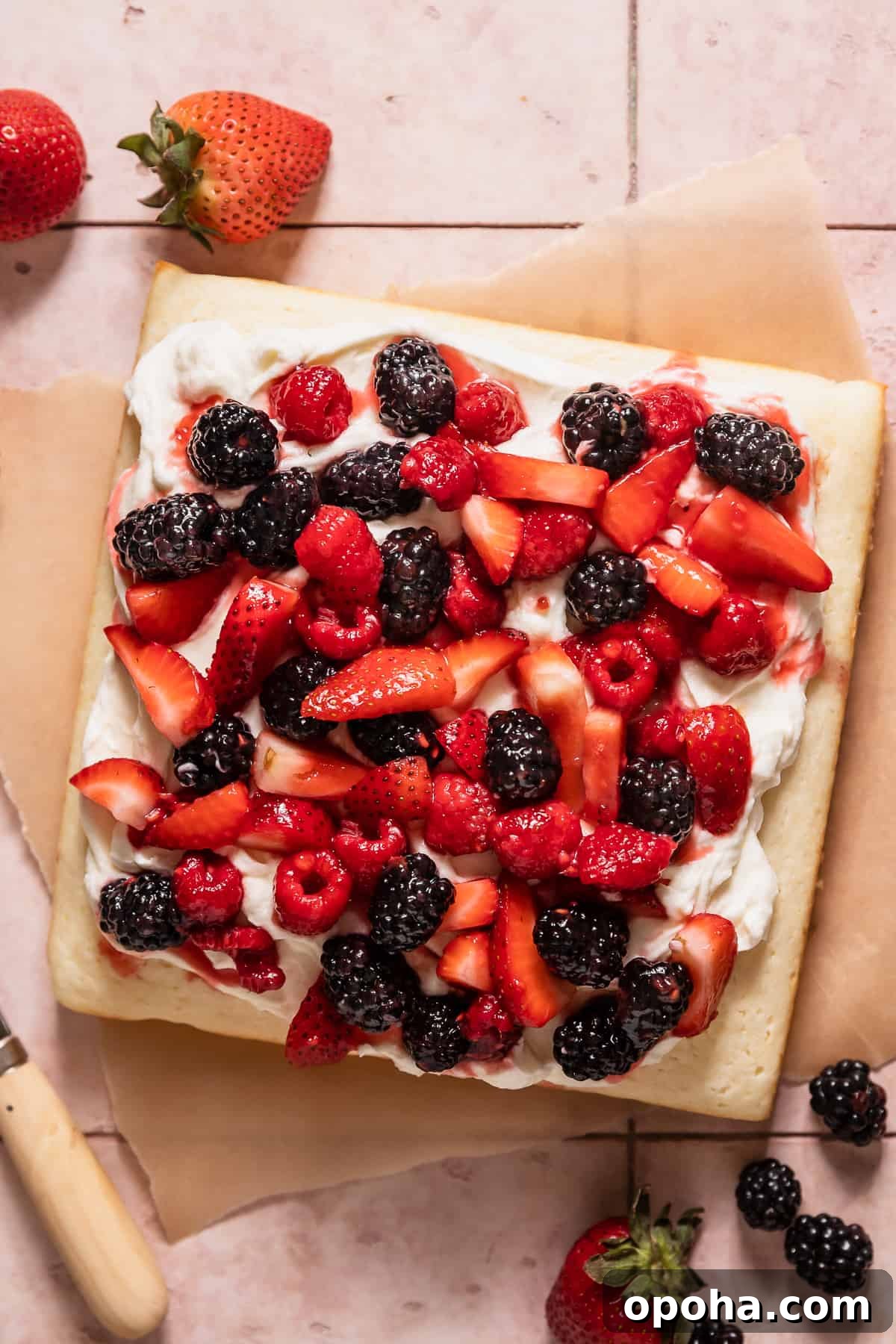 Lemon Berry Mascarpone Layer Cake 2 lemon berry mascarpone cake with fresh berries on top.