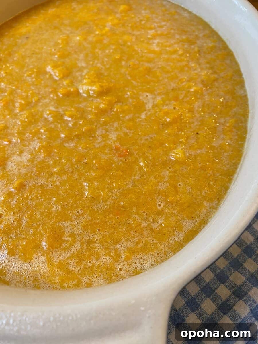 Unbaked butternut squash mixture in a casserole dish.