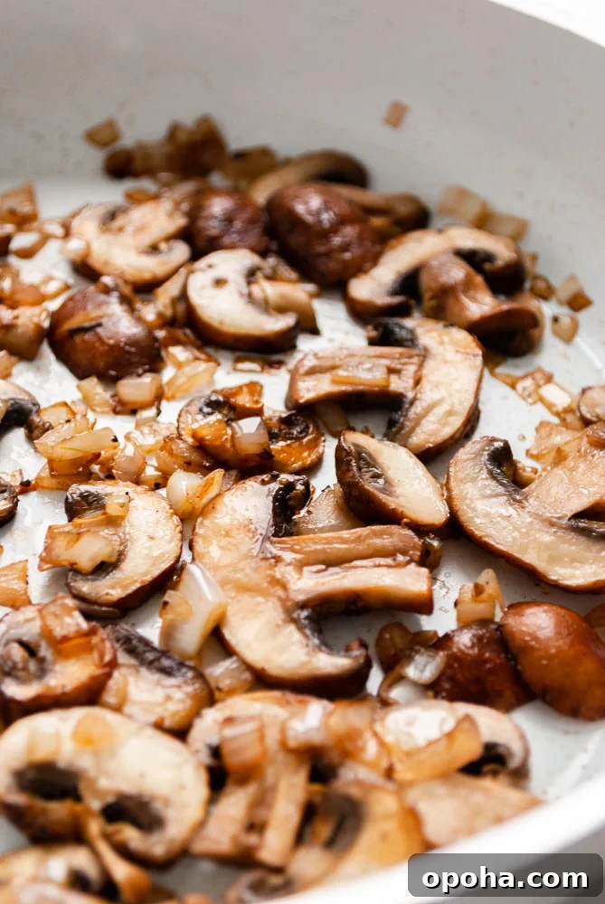 sautéing mushrooms and shallots in a skillet