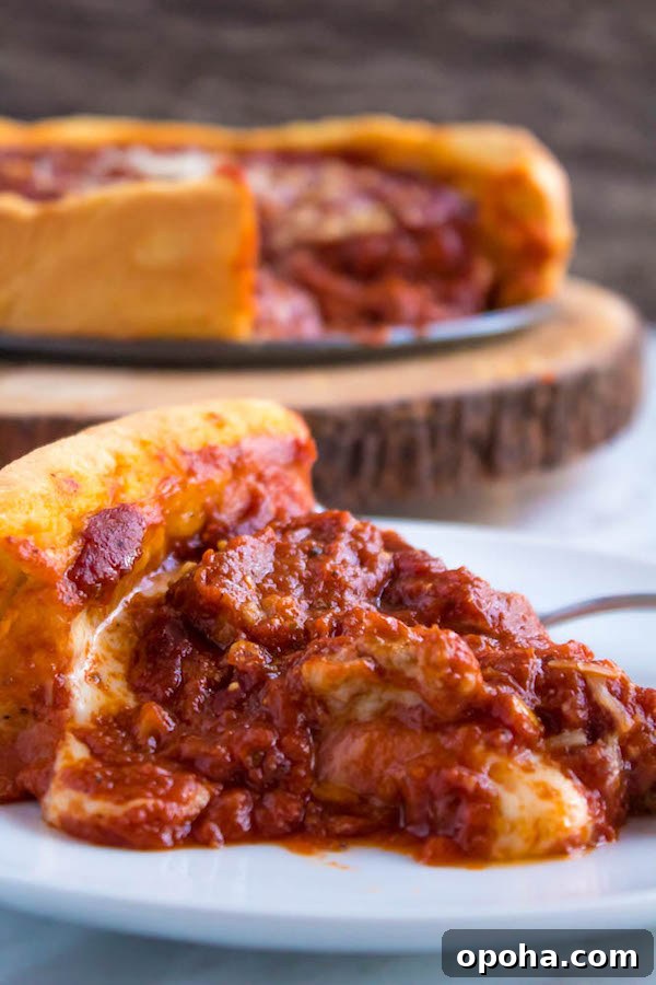 Authentic Chicago Deep-Dish Pizza Guide 3 Slice of Chicago Deep Dish Pizza showing layers of cheese, toppings and sauce