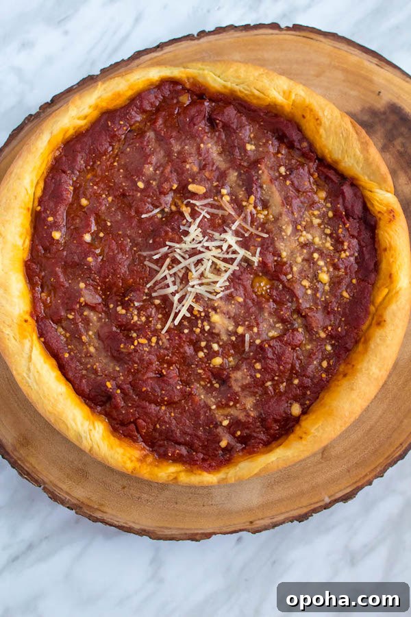 Authentic Chicago Deep-Dish Pizza Guide 5 Deep dish pizza in pan before baking