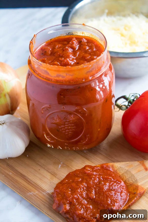 Authentic Chicago Deep-Dish Pizza Guide 9 Thick homemade pizza sauce in a saucepan